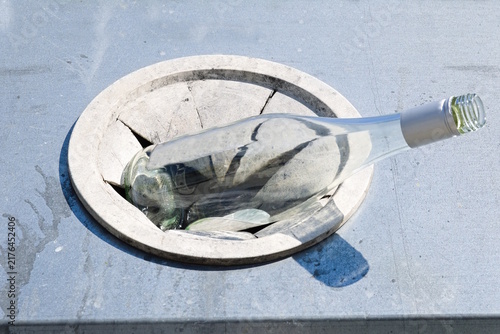 WhiteGlass Bottle in Recycling Container Slot