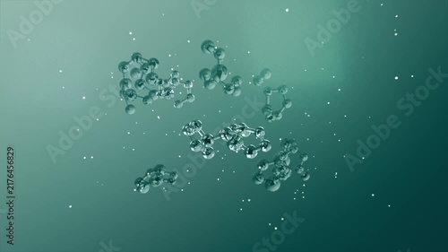 Camera moving, center glass cluster drifting closer, revealing gleam and specks against teal plane