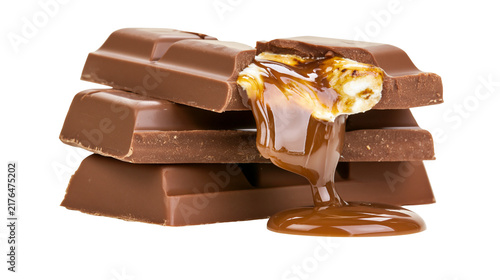 Fotografie Stack of milk chocolate bars with gooey caramel filling, isolated on transparent