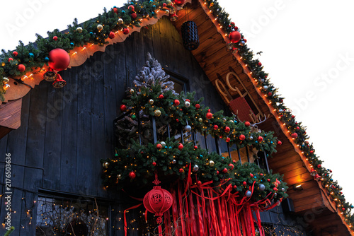 Obraz na plátně Festive Christmas decorations adorn a balcony in a mountain cabin during the hol