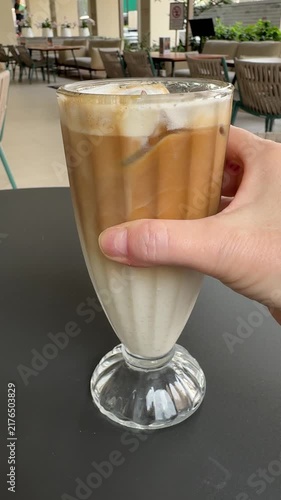 Serving a Delicious Cold Iced Latte Coffee