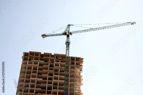 Concrete structural framework and window installation of modern multi-story building