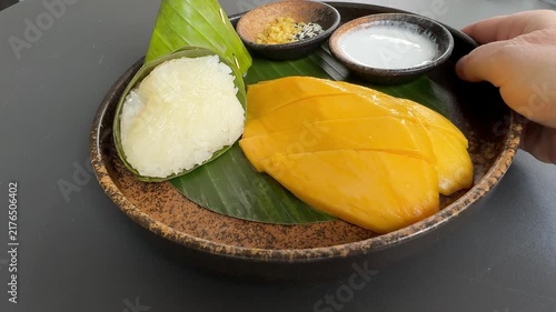 Serving a Place of Mango and Sticky Rice
