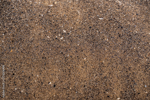 Canvastavla Close up view of natural volcanic sand composed of dark brown grains and tiny cr