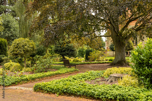 Corner of an old metropolitan park in England. Pleasant green space is a common feature of UK towns and cities.