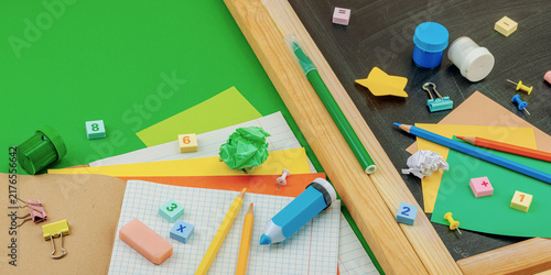 Canvastavla Eco-friendly flat lay with school supplies, wooden toys on green background