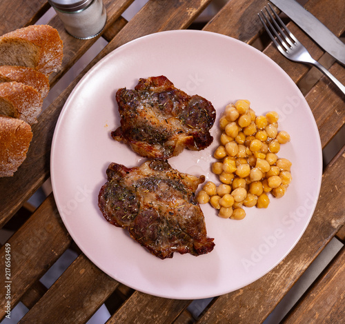 Obraz na plátně Cooked beef stew with chickpeas according to Spanish recipe, served on a ceramic