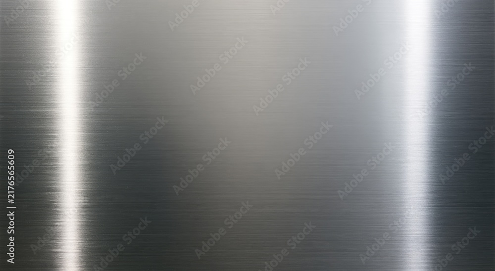 Obraz premium Reflective, brushed metallic surface with vertical light streaks