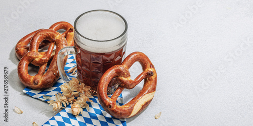 Traditional Oktoberfest set. Pretzels and beer, German festival food concept. Trendy hard light