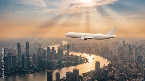 Aircraft soars over futuristic city with sun rays breaking through clouds