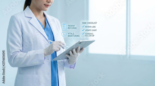 Female Doctor Using Holographic Medical Tablet