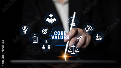 Bild auf Leinwand Hands Holding Stylus on Tablet with Icons Representing Core Values and Business Concepts in a Dark Background for Professional Use Fluxor