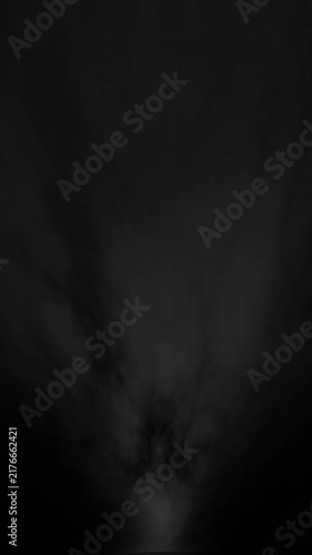 Cinematic dust smoke moving fast vertical on black background. soil powder smoke overlay drifting up, seamless cinematic loop 4k
