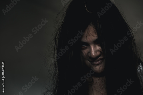 Photography Portrait of Asian ghost or zombie horror creepy scary have hair covering the fac