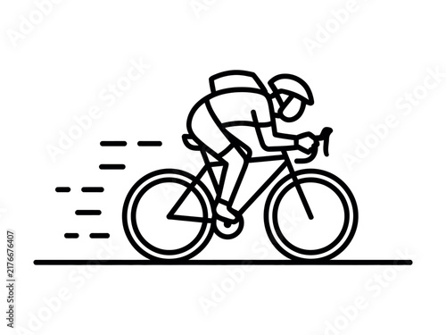 Cyclist with helmet and backpack rides bicycle fast while training outdoors on a sunny day
