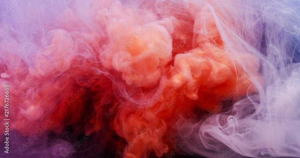 Fototapeta premium Color mist. Paint splash. Defocused red purple underwater vapor liquid glitter water bright texture spreading on abstract vibrant art background.