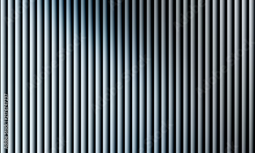 Abstract black and white vertical lines pattern with gradient shadows