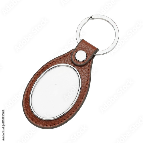 Brown leather oval keychain with metal ring isolated on white background