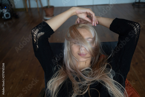Portrait of a beautiful young woman in a studio 