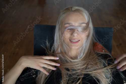 Portrait of a beautiful young woman in a studio.