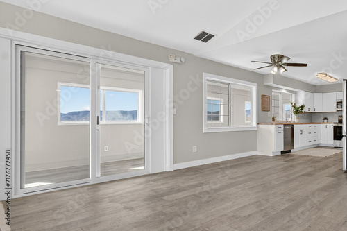 Bright open living area with sliding doors and kitchen