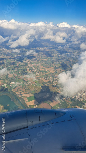 Flying an airplane above the clouds