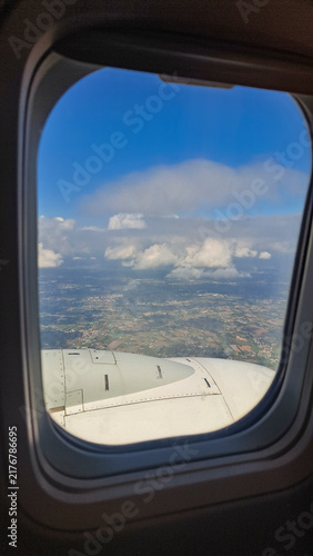 Flying an airplane above the clouds