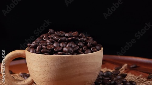 Roasted coffee beans with a rich texture and glossy surface.
