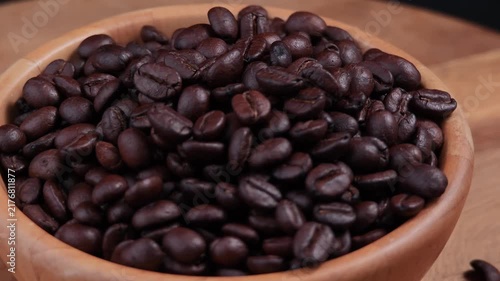 Roasted coffee beans with a rich texture and glossy surface.