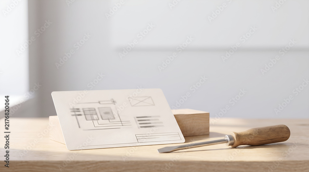 Obraz premium Repair card with diagram and wooden handled screwdriver on desk