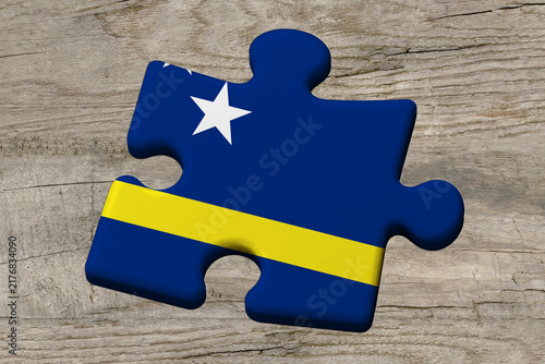 3D illustration. Flag of Curacao on a jigsaw puzzle pieces on a wood background.
