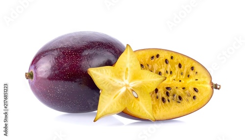 Purple and yellow sliced passion fruit halves.