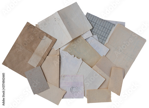 Top view of vintage paper documents with old stamp marks in a flat lay collage isolated on white