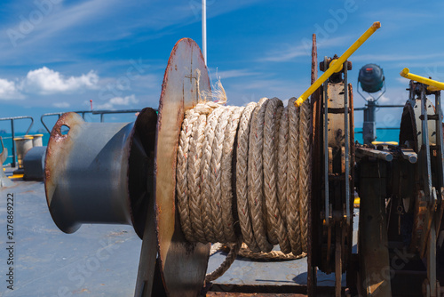Photography Weathered Mooring Winch and Coiled Rope on Ferry Deck