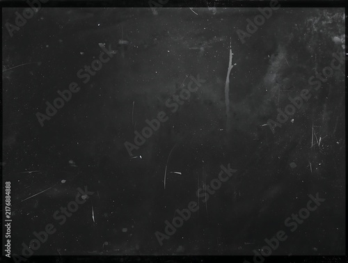 Dark moody film grain overlay with vertical scratch and scattered dust specs moody background analog texture