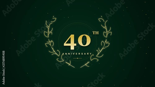 elegant motion graphic showcasing a golden 40th anniversary celebration logo with a glowing laurel wreath on a dark green background adorned with subtle particles.