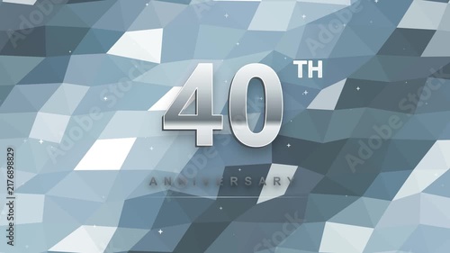 sleek and elegant motion graphics video featuring a metallic silver 40th anniversary celebration text against an abstract blue and white low-poly geometric background with subtle twinkling stars.