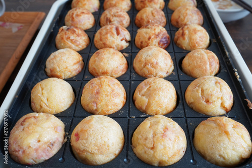 Popular Japanese Takoyaki Cooking on a Hot Iron Plate