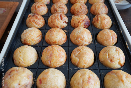 Popular Japanese Takoyaki Cooking on a Hot Iron Plate