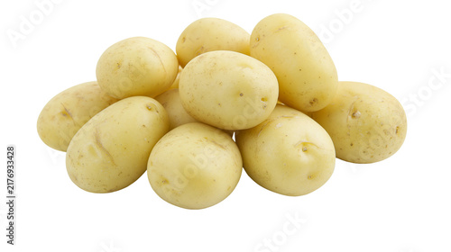 Bild auf Leinwand Fresh raw yellow potatoes piled together