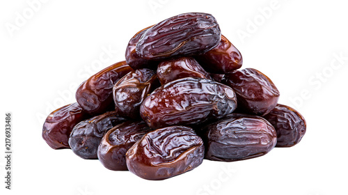 Heap of sweet dried brown date fruits with wrinkled skin texture