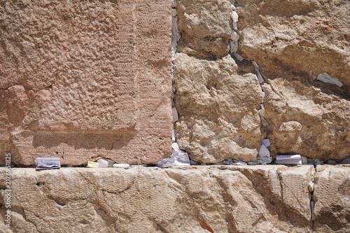 Bild auf Leinwand pieces of paper with written  prayers pushed between cracks in Western wall, Jer