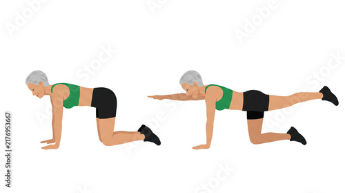 Mature woman performing bird dog core stability exercise on hands and knees extending opposite arm and leg to improve balance and posture