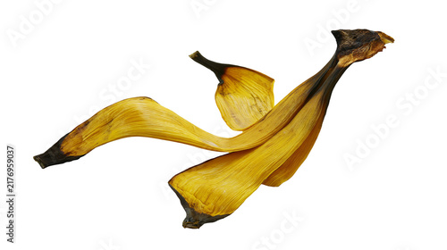 Quadro su tela Discarded yellow banana peel with dark brown spots and dried edges
