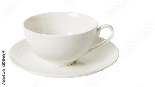 Empty white ceramic teacup with matching saucer