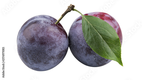 Fotografie Two ripe purple plums with green leaf and stem