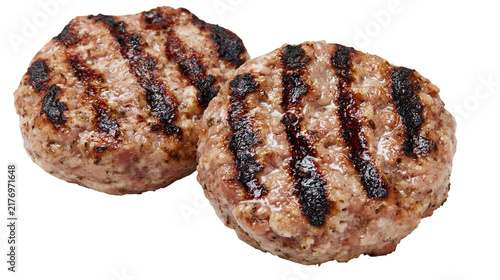 Two juicy grilled beef burger patties with dark char marks