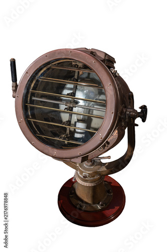 Vintage nautical signal light with louvered shutters and internal bulb mounted on a pedestal, isolated on a white background.