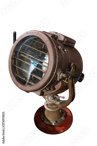 Vintage nautical signal light with louvered shutters mounted on a pedestal, isolated on a white background.