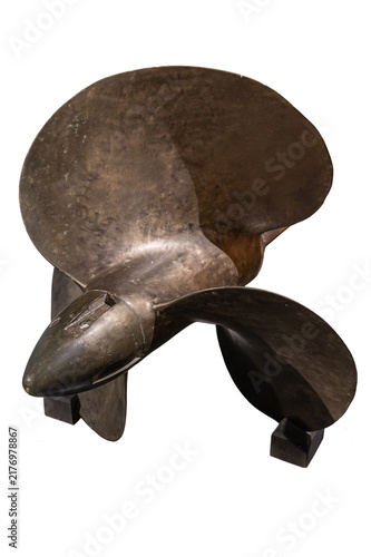 Vintage bronze ship propeller closeup, marine propulsion screw blade isolated on a white background.